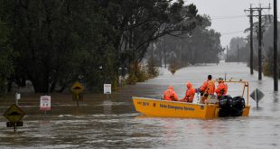 ‘Once in a century’ floods cut off communities in northwestern Australia